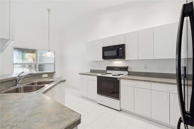 kitchen featuring white cabinetry, decorative light fixtures, vaulted ceiling, black appliances, and sink