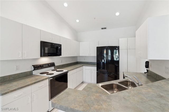 kitchen featuring vaulted ceiling, sink, white cabinets, and black appliances