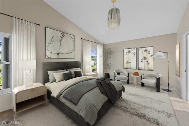 carpeted bedroom featuring lofted ceiling and multiple windows