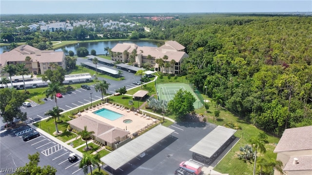 birds eye view of property featuring a water view