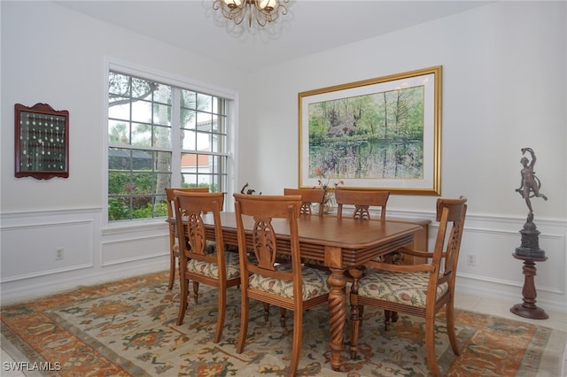 dining room with a notable chandelier