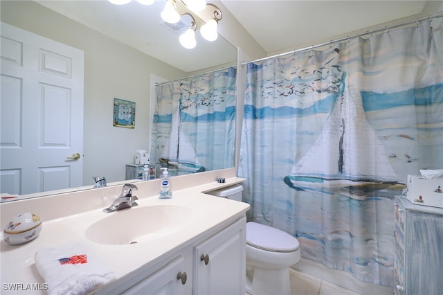 bathroom with tile patterned flooring, vanity, curtained shower, and toilet