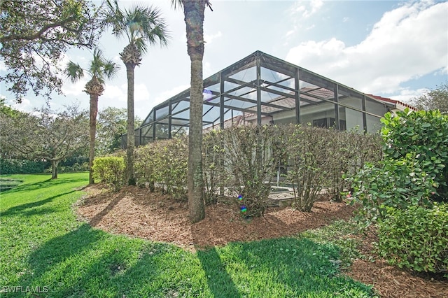 view of yard featuring a lanai