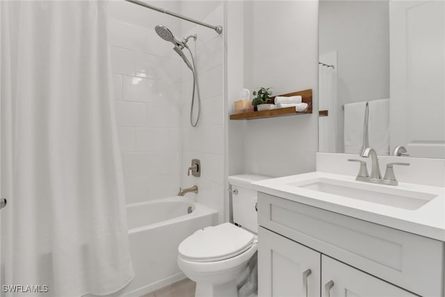 full bathroom featuring shower / bath combo, toilet, and vanity