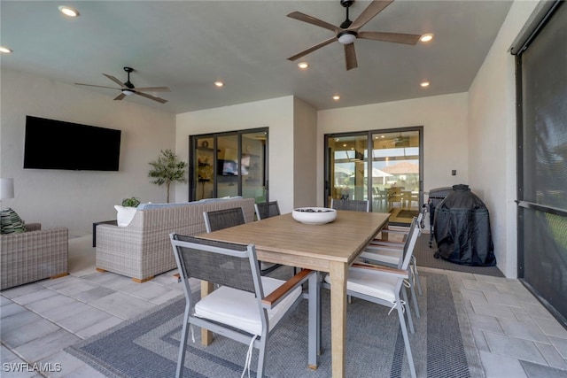 dining space featuring ceiling fan