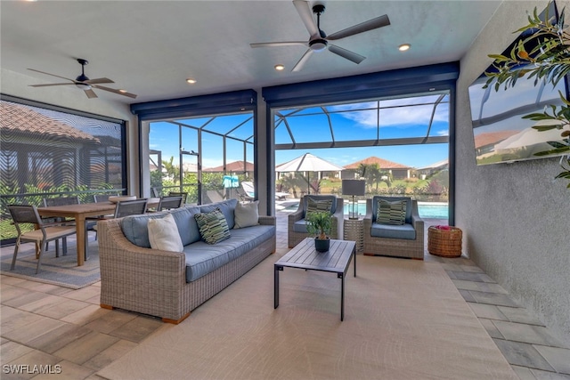 sunroom / solarium with ceiling fan