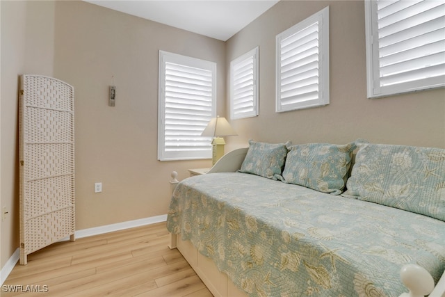 bedroom featuring light hardwood / wood-style floors