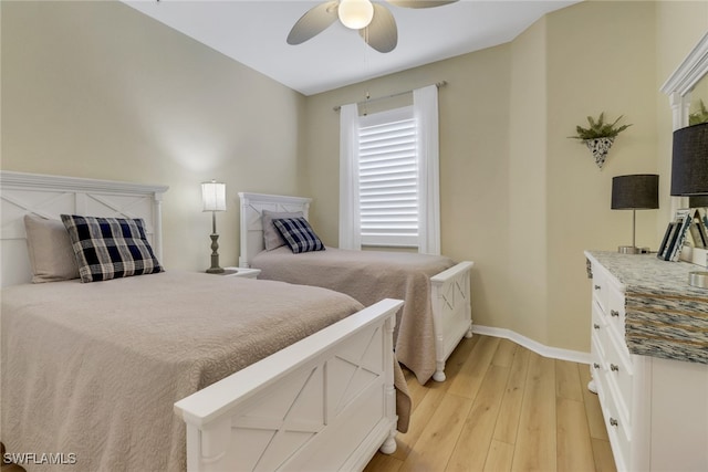 bedroom featuring ceiling fan and light wood-type flooring