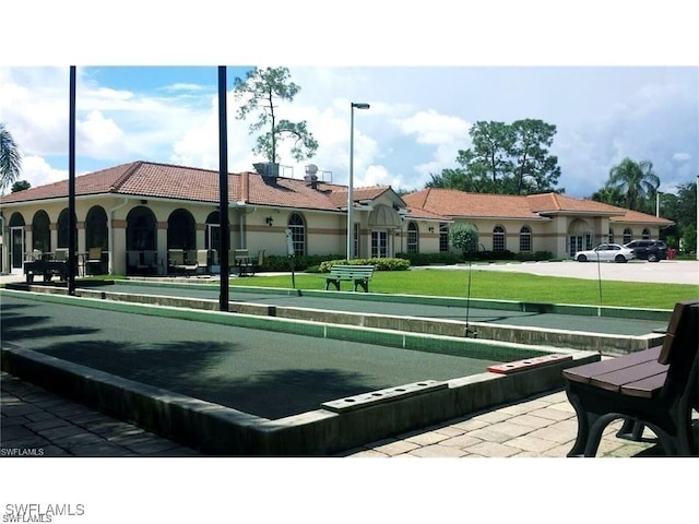 view of community with a lawn