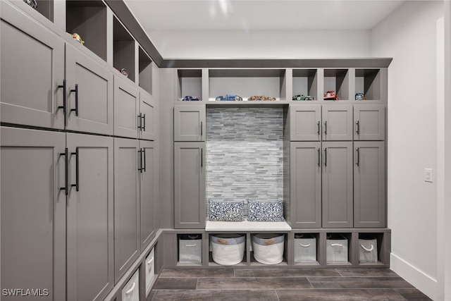 mudroom with dark hardwood / wood-style floors