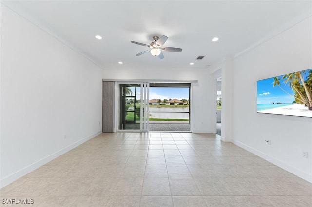 spare room featuring a ceiling fan, visible vents, baseboards, light tile patterned flooring, and recessed lighting