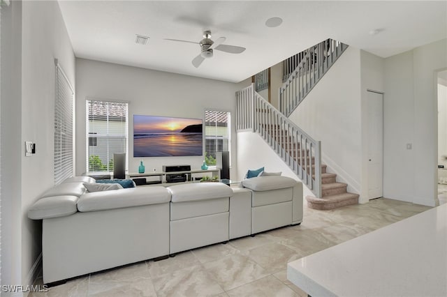 living room featuring ceiling fan