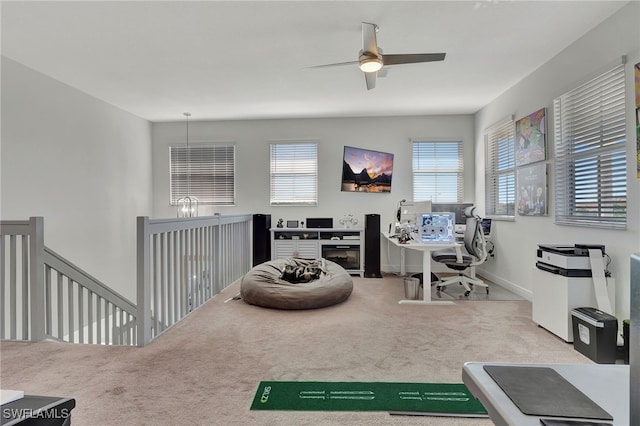 office area with ceiling fan and light colored carpet