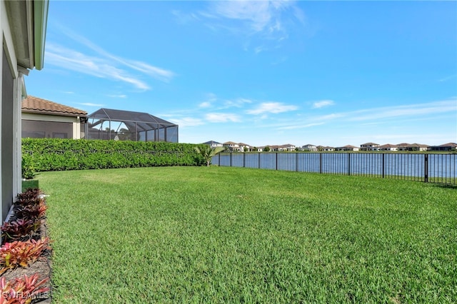 view of yard featuring a lanai