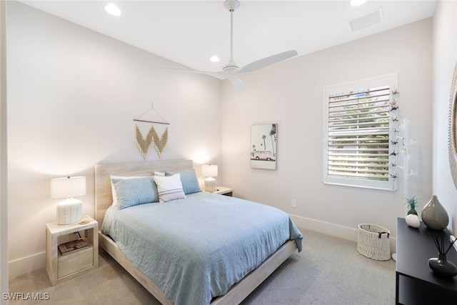 bedroom with light carpet and ceiling fan