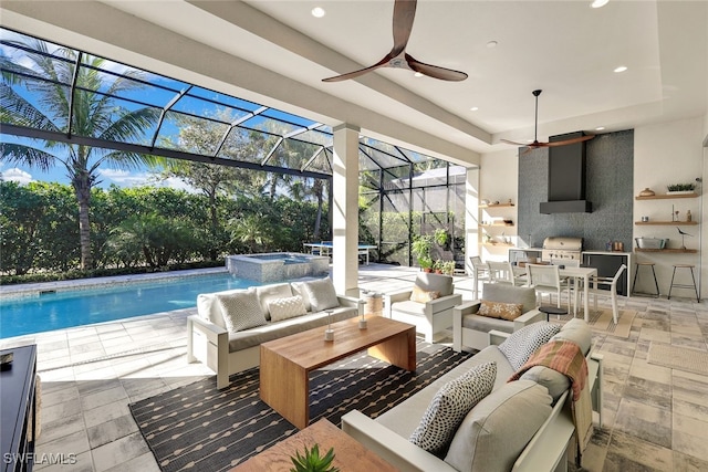 exterior space featuring a patio, glass enclosure, an outdoor living space, an outdoor kitchen, and an in ground hot tub