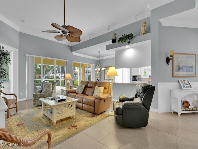 tiled living room featuring ceiling fan with notable chandelier and ornamental molding