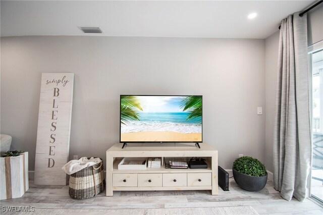 living room featuring light wood-type flooring