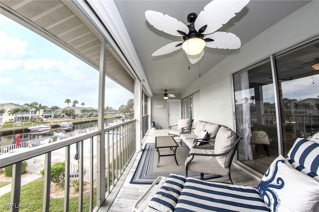 balcony featuring a water view