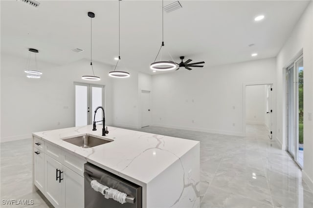 kitchen featuring ceiling fan, sink, dishwasher, white cabinetry, and hanging light fixtures