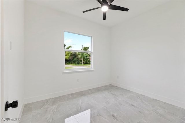 spare room featuring ceiling fan