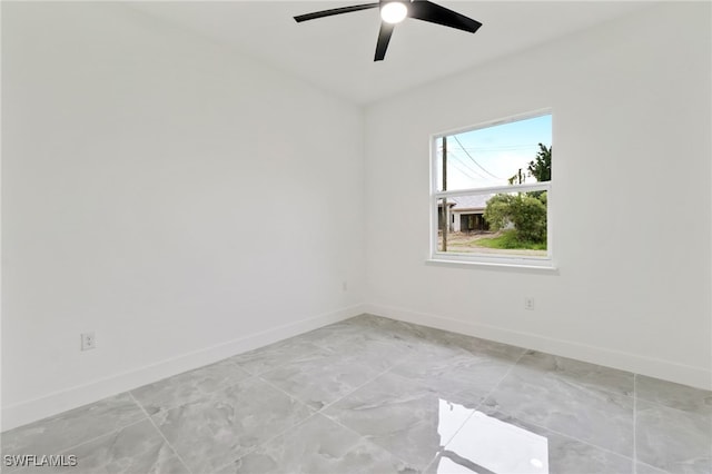 spare room featuring ceiling fan