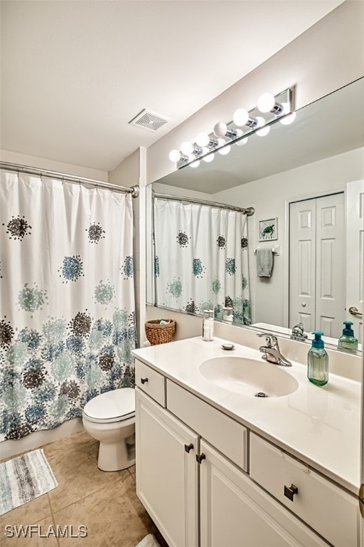 bathroom featuring tile patterned flooring, vanity, toilet, and a shower with shower curtain