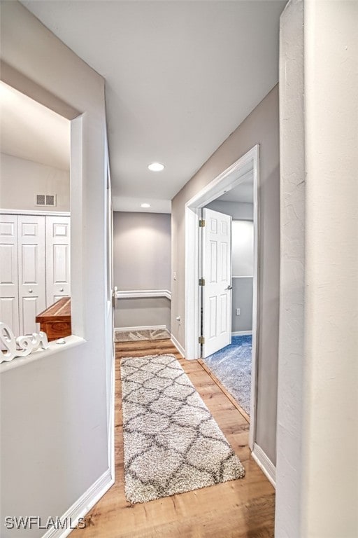 hall featuring hardwood / wood-style floors