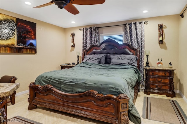 bedroom featuring light tile patterned floors and ceiling fan