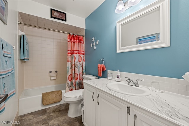 full bathroom featuring tile patterned flooring, vanity, toilet, and shower / bathtub combination with curtain