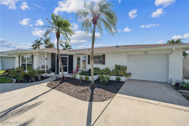 single story home with a garage