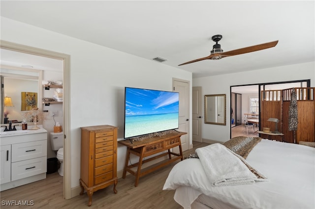 bedroom featuring ceiling fan and light wood-type flooring