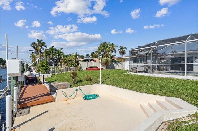 view of patio with glass enclosure