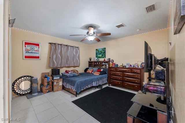 bedroom featuring light tile patterned floors and ceiling fan