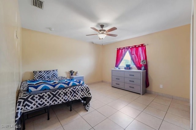 bedroom featuring ceiling fan and light tile patterned floors