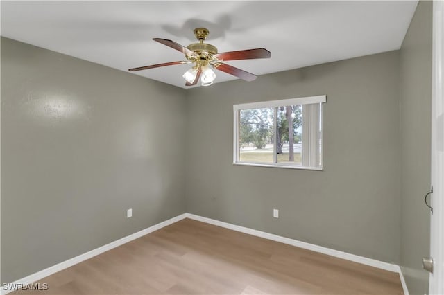 empty room with light hardwood / wood-style flooring and ceiling fan