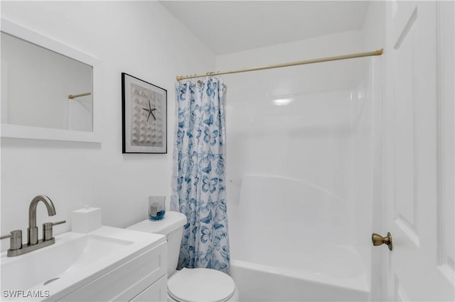 full bathroom featuring vanity, shower / bath combo, and toilet