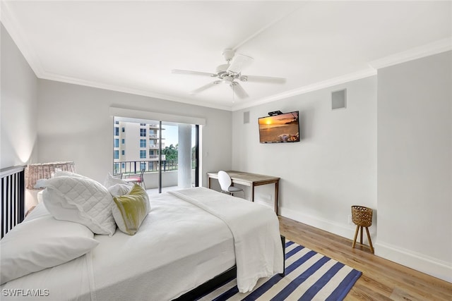 bedroom featuring ceiling fan, light hardwood / wood-style floors, access to exterior, and crown molding