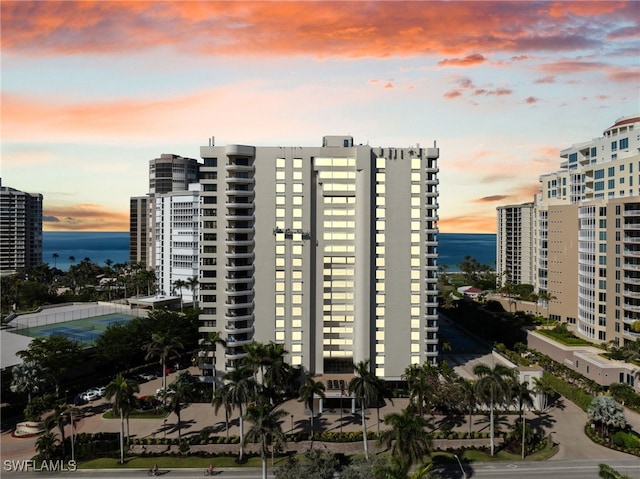 outdoor building at dusk with a water view