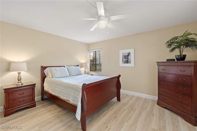 bedroom featuring ceiling fan and light hardwood / wood-style flooring