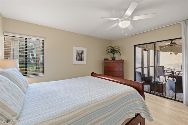 bedroom with light hardwood / wood-style flooring and ceiling fan