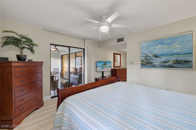 bedroom with ceiling fan and light wood-type flooring