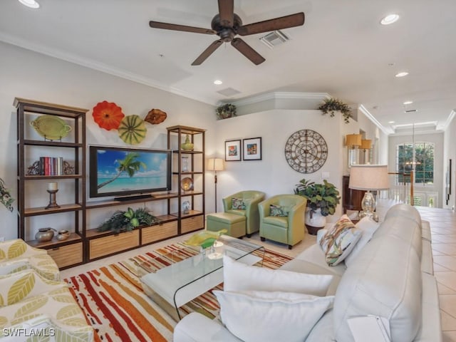 living room with ceiling fan, light tile patterned flooring, and crown molding