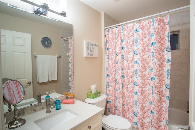 bathroom featuring vanity, toilet, and walk in shower