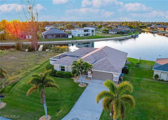 drone / aerial view featuring a water view