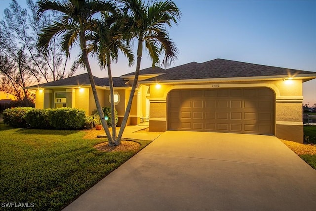 2902 SW 10th Pl, Cape Coral, FL 33914 - ranch-style house with stucco siding, an attached garage, driveway, and a lawn