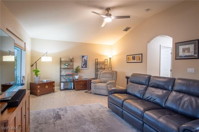 2902 SW 10th Pl, Cape Coral, FL 33914 - living area with vaulted ceiling, arched walkways, ceiling fan, and light tile patterned floors