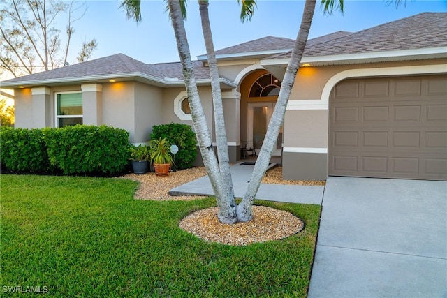 2902 SW 10th Pl, Cape Coral, FL 33914 - view of front of home featuring stucco siding, a front lawn, a garage, a shingled roof, and concrete driveway