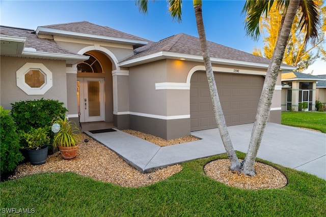 view of front of property featuring a garage