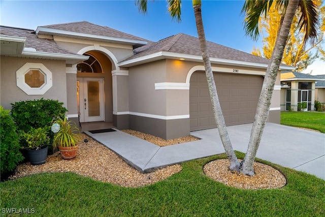 2902 SW 10th Pl, Cape Coral, FL 33914 - view of front of home with stucco siding, a garage, concrete driveway, and a shingled roof